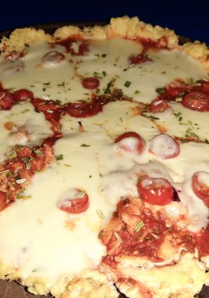 Una foto de Pizza de pollo🍗🍗🍗👌👌👌