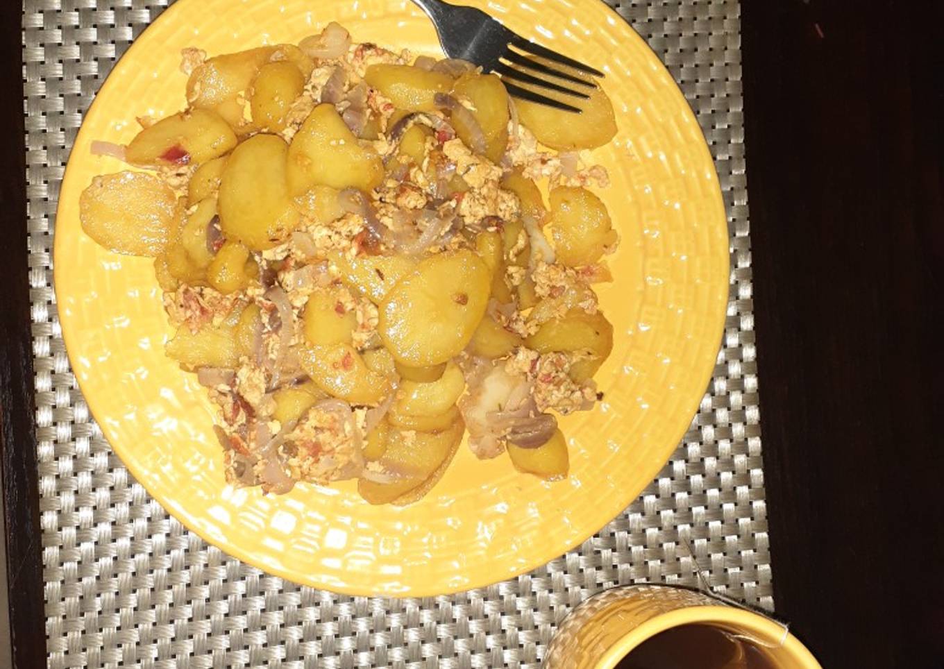 Fried potato in scrambled eggs