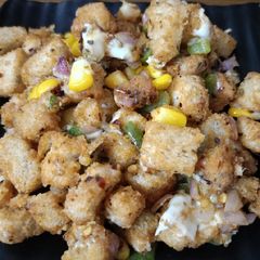 A picture of Cheesy bread poha.