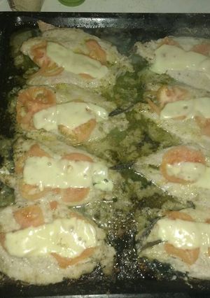 Una foto de Merluza gratinada con queso derretido
