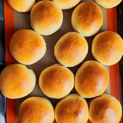 A picture of Sweet soft roll with whipped cream instead milk.
