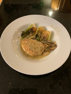 A picture of Swordfish sh Fi in a Jalapeño Lemon Butter Sauce.