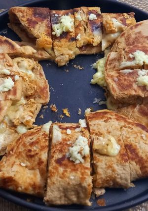 A picture of Chicken Tikka Cheesy Shawarma 🥙.