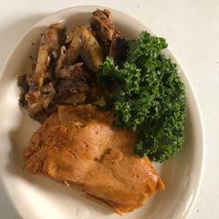 A picture of Moi moi with barbecue chicken n kale.