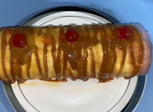 Una foto de Pionono de dulce de leche