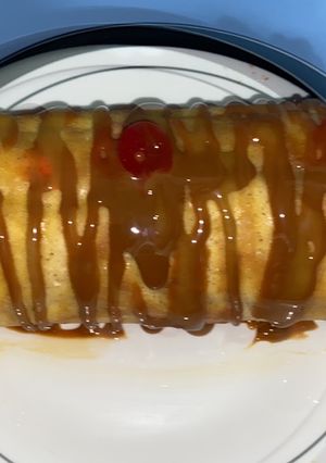 Una foto de Pionono de dulce de leche