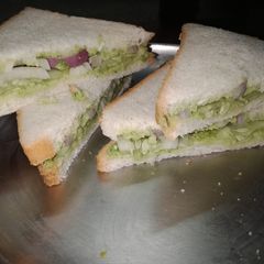 A picture of Cucumber and onion sandwich.