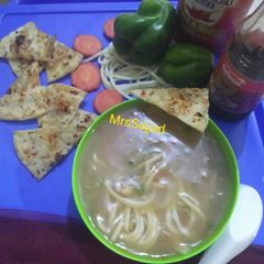 A picture of Minestrone Soup With Crispy Pita Garlic Toast.