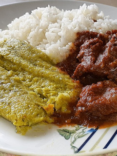 Una foto de Cabrito con Humitas Verdes