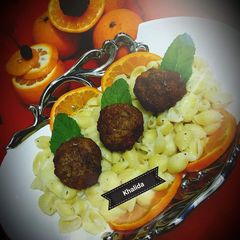 A picture of Creamy pasta with mutton orange meatballs.