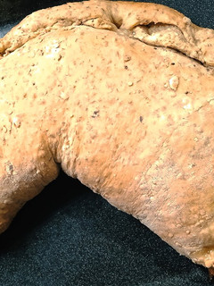 Una foto de Calzone de puerros, cebolla y queso