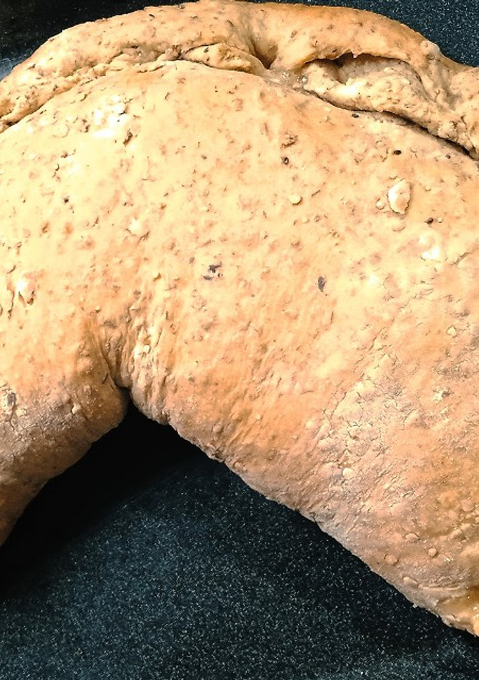 Una foto de Calzone de puerros, cebolla y queso