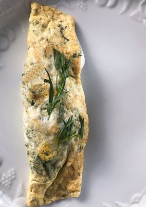 Una foto de Omelette de espinacas y queso de cabra