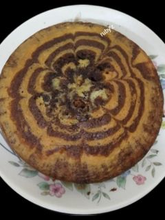এগ লেস চকলেট মার্বেল কেক (Eggless chocolate marble cake recipe in Bengali) রেসিপির প্রধান ছবি