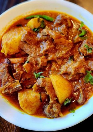 A picture of Spicy Mutton Masala or Aloo Gosht.