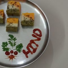 A picture of Tricolour Instant Rava Dhokla with Natural Colours !!.