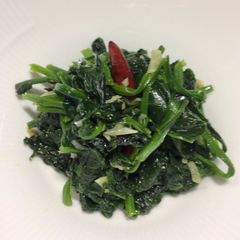 A picture of #9 Sauteed Spinach with roasted garlic.