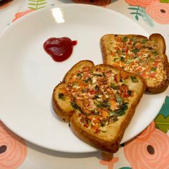 A picture of Bread pizza -Breakfast Menu.
