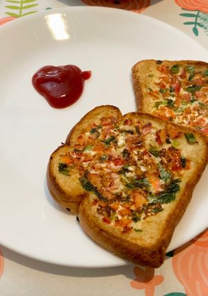 A picture of Bread pizza -Breakfast Menu.