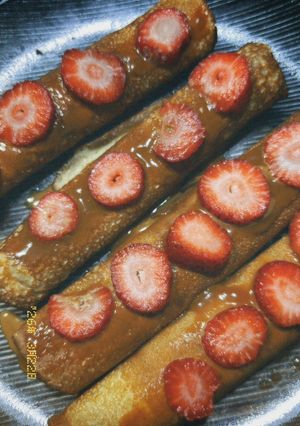 Una foto de Panqueques con dulce de leche