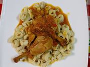 Una foto de cappelletti de pollo