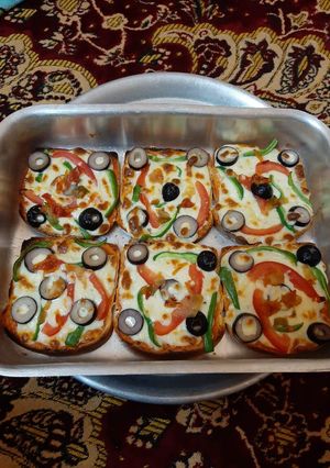 صورة لوصفة بيتزا بالتوست 🤭