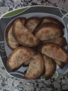 Una foto de Empanadillas de bacalao y tomate