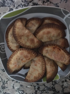 Una foto de Empanadillas de bacalao y tomate