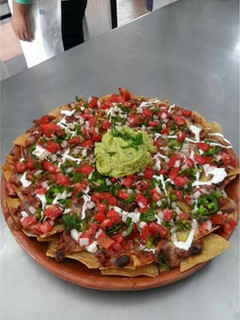 Una foto de Chili con carne y nachos con chili