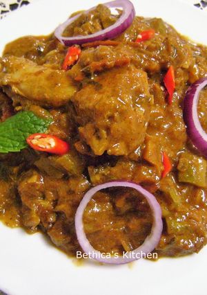 A picture of Turai Chicken (Chicken cooked with Ridge Gourd).