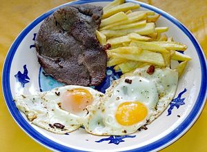 Una foto de Bistec de Huachalomo a lo Pobre