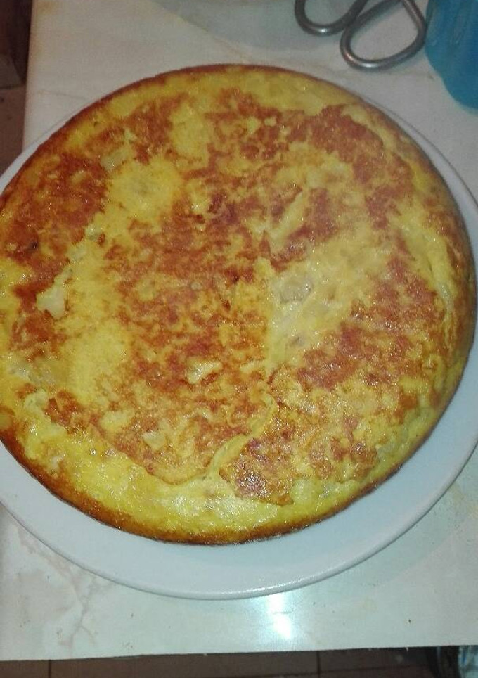 Una foto de Tortilla de patatas con huevos camperos en la olla GM