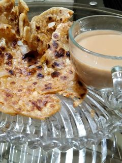 प्याज़ का स्टफ्ड लच्छा पराठा(pyaz ka stuffed lachha paratha recipe paratha in hindi) रेसिपी मुख्य फोटो