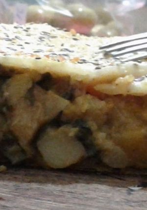 Una foto de Pastel de vegetales y hongos