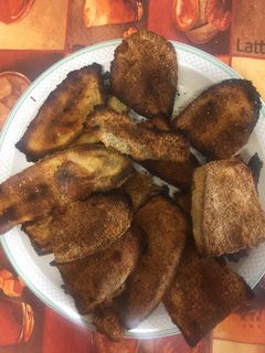 Una foto de Berenjenas rebozadas al horno