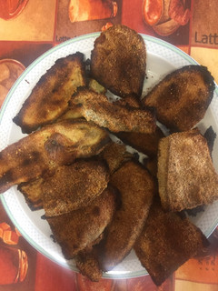 Una foto de Berenjenas rebozadas al horno