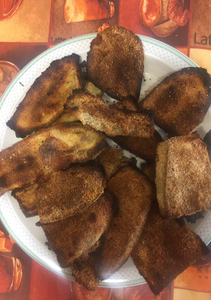 Una foto de Berenjenas rebozadas al horno