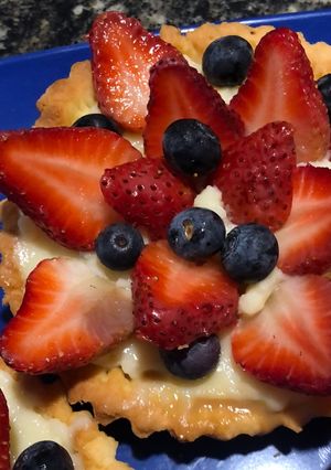 Una foto de Tartas mini de arándanos y frutillas