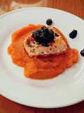 Sauteed salmon filet on sweet potato puree with bluberry compote