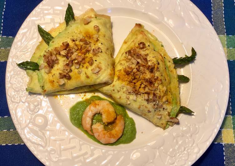 Crespelle di zucca con ricotta, asparagi e gamberi