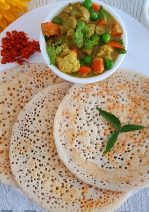 A picture of Set Dosa with vegetable sagu (mixed veggies curry)..
