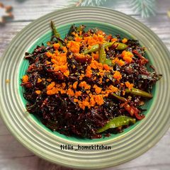 A picture of Indo-Thai Style Sautéed Red Amarnath with Beans.