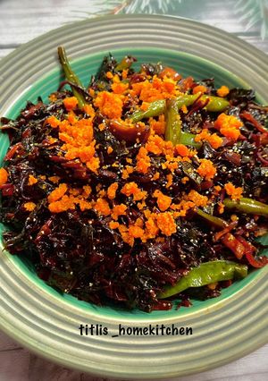 A picture of Indo-Thai Style Sautéed Red Amarnath with Beans.