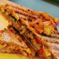 A picture of Paneer Bhurji grilled sanwich.
