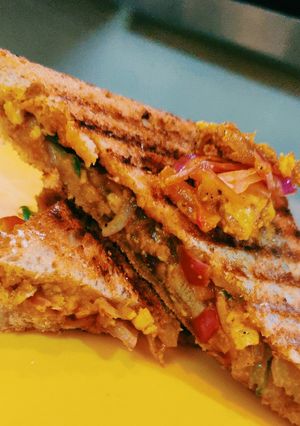A picture of Paneer Bhurji grilled sanwich.