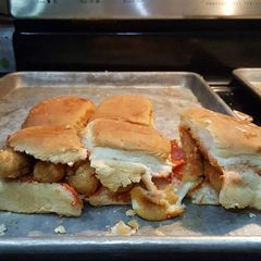 A picture of Pepperoni mozzarella cheesestick sliders.