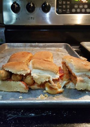 A picture of Pepperoni mozzarella cheesestick sliders.