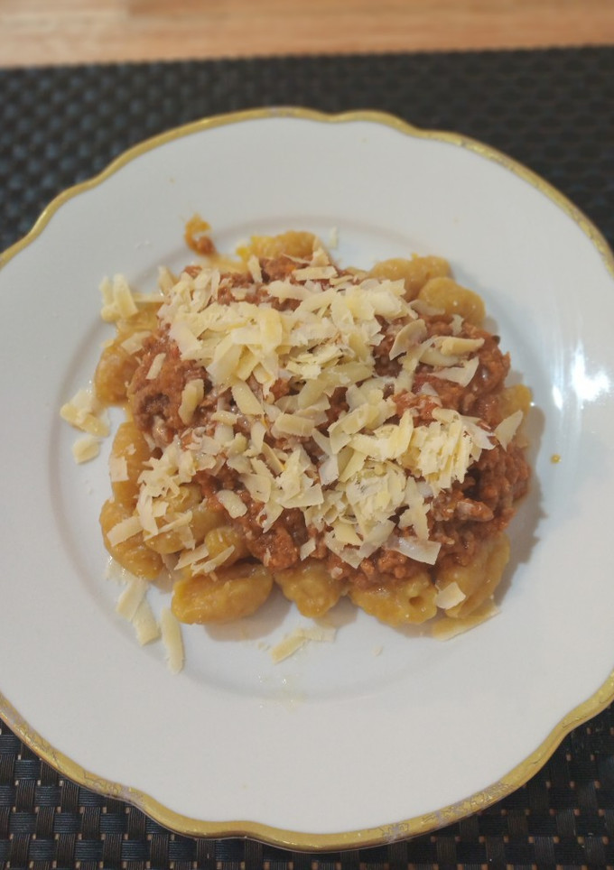 Una foto de Ñoquis de Calabaza con Salsa Bolognesa