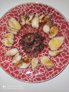 Una foto de Mini chipirones a la plancha con salsa verde