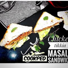 A picture of Chicken tikka masala sandwich.